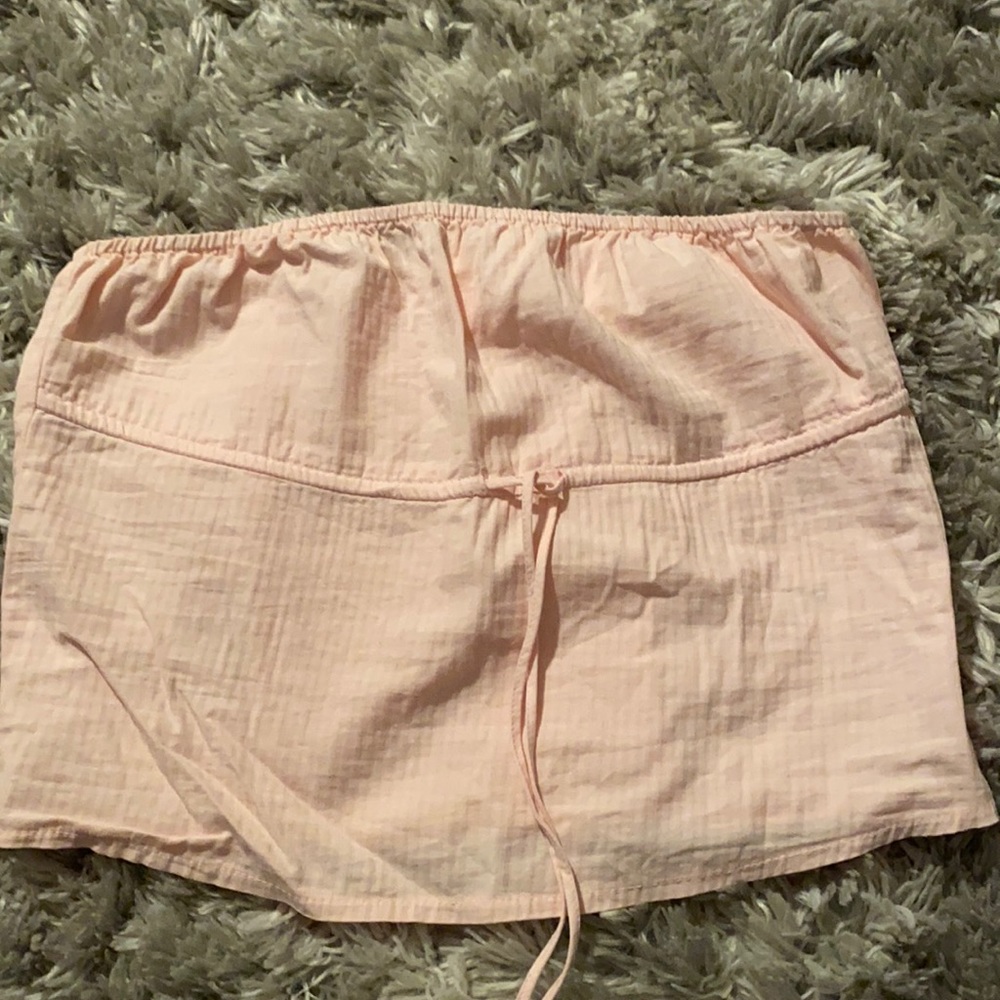Brandy Melville light pink tube top.